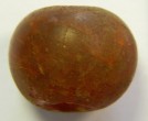 Cloudy, untreated amber bead.